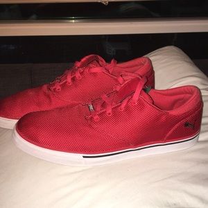 Used red puma shoes size 12